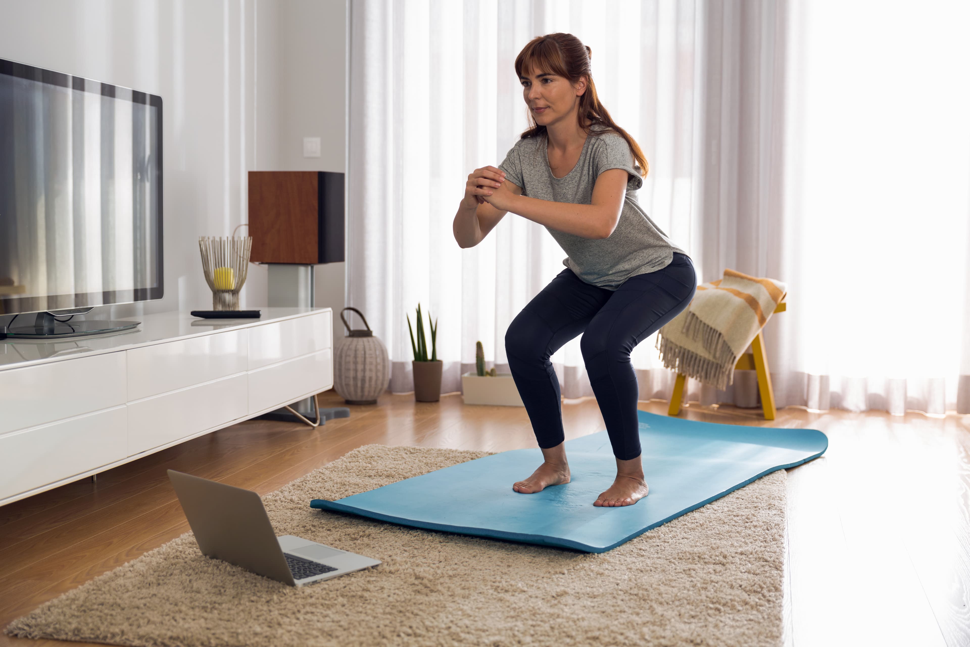 exercice de squat prescrit par un kinésithérapeute